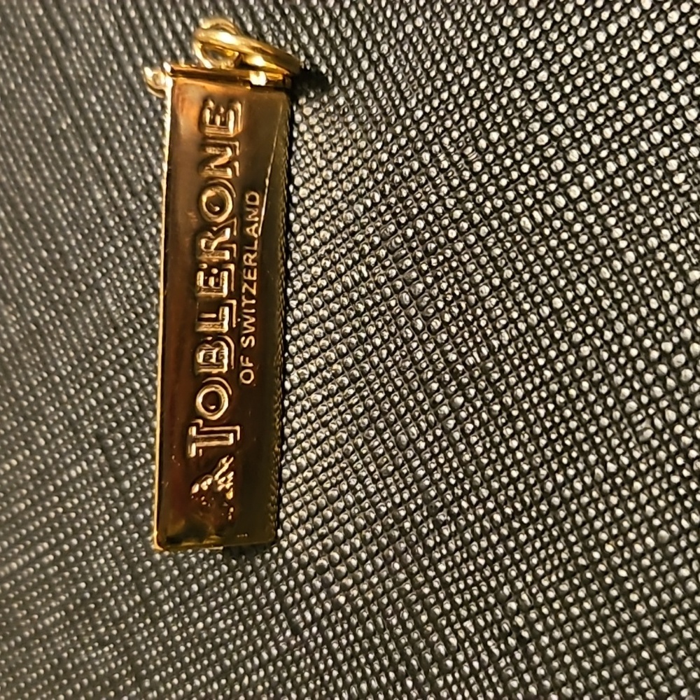 Jet set candy charm